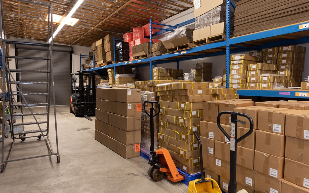 WCE component stockroom with reel inventory and kitted material